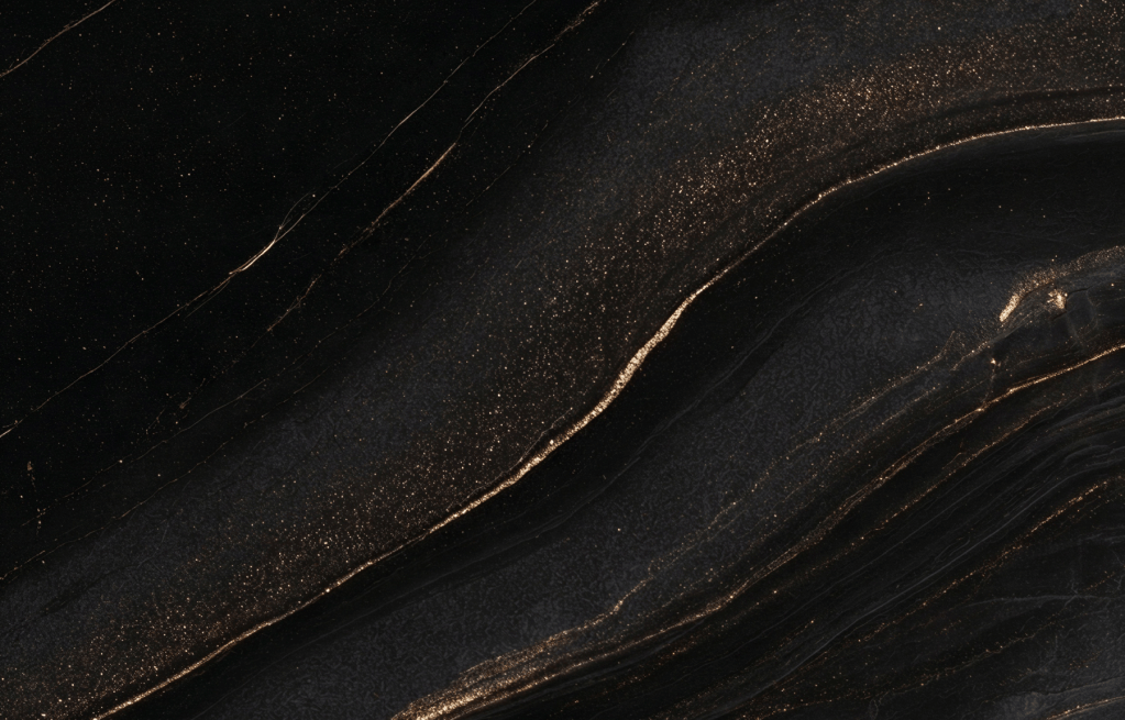 Black granite with gold veins.